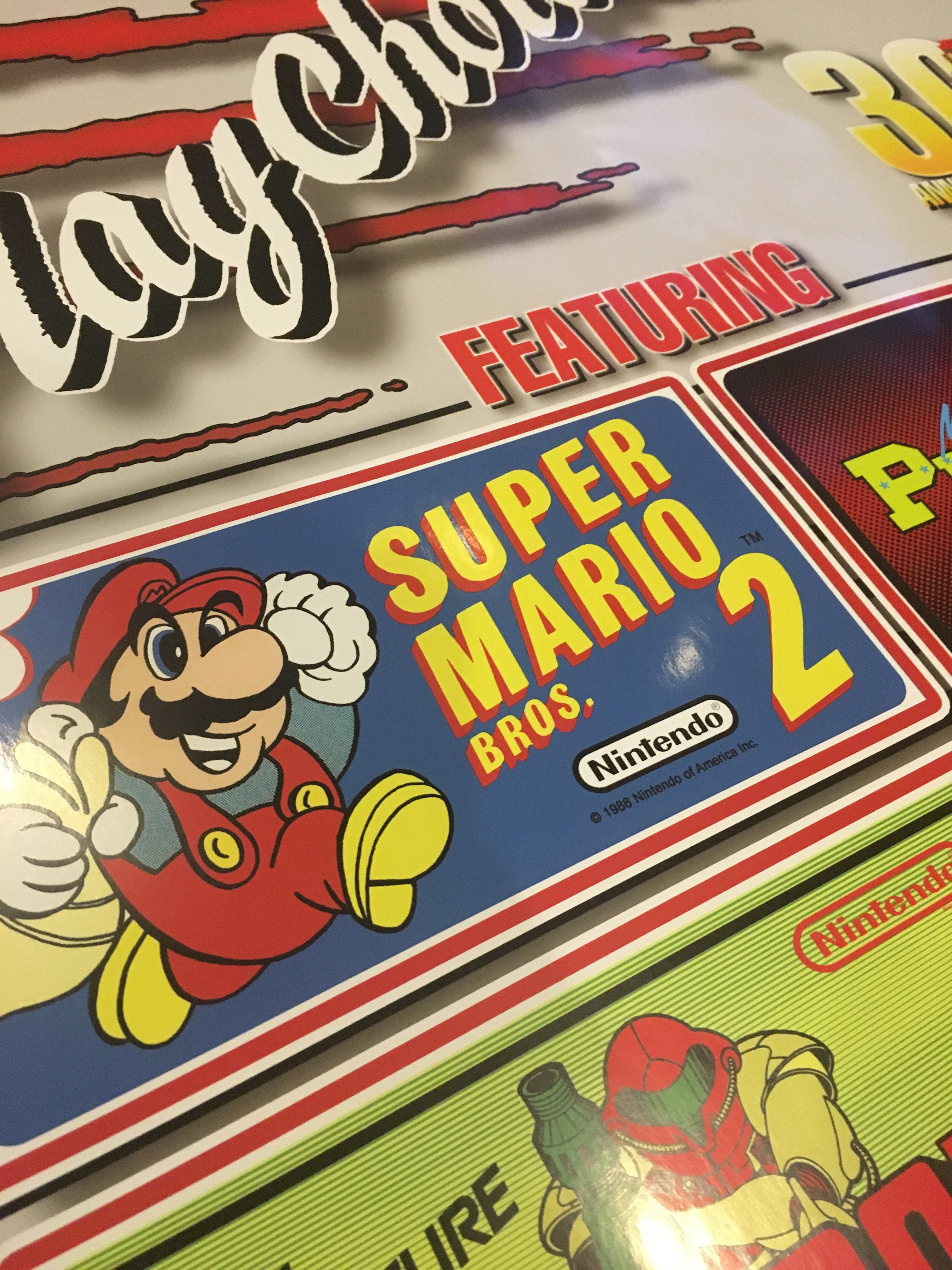 Arte secundario del décimo aniversario de PlayChoice