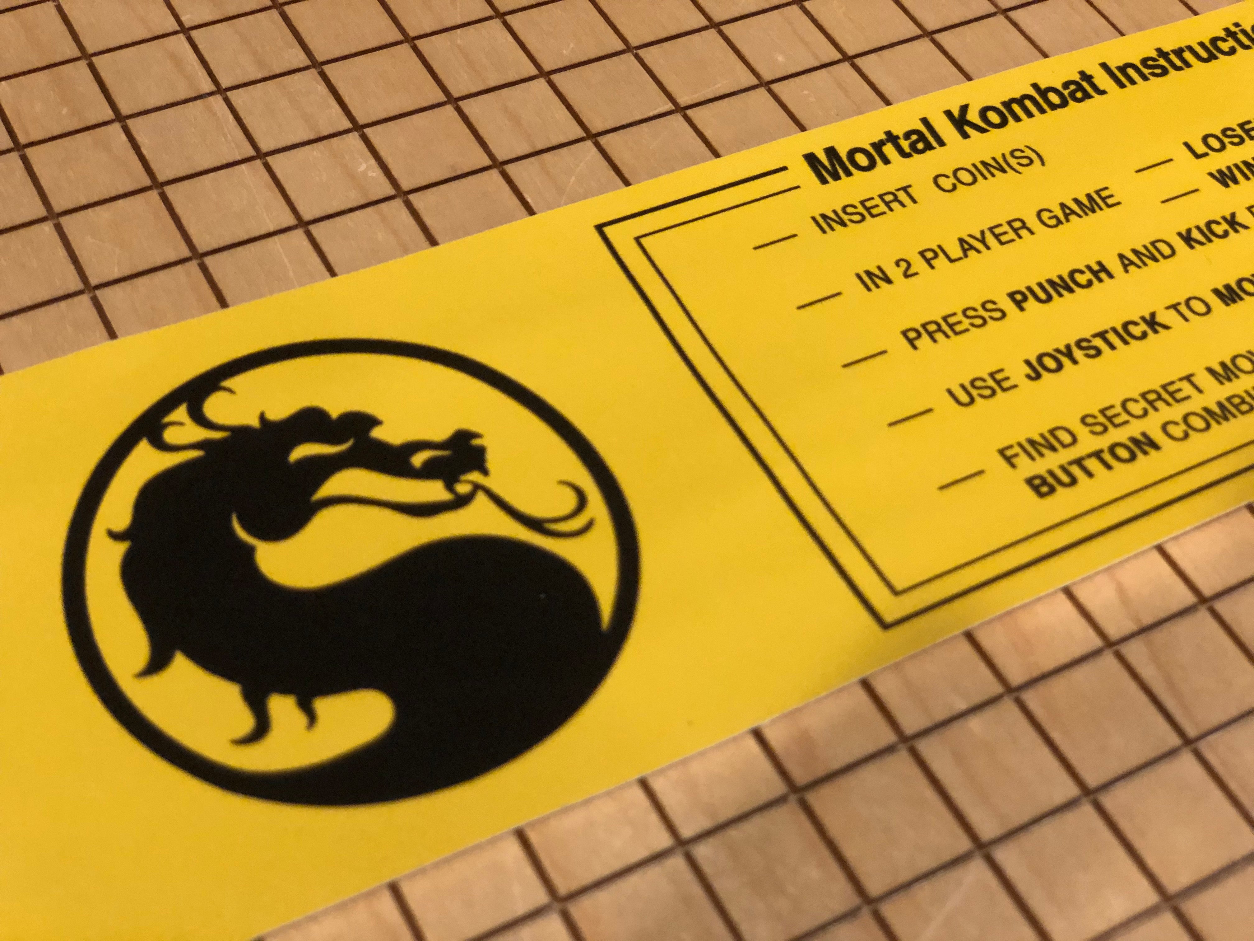 Tarjeta de instrucciones de Mortal Kombat